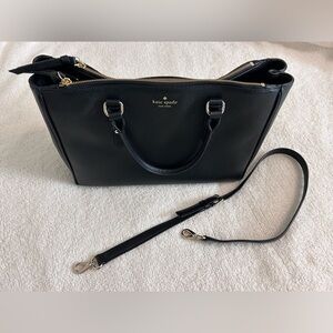 Kate spade black purse with long strap and gold hardware.